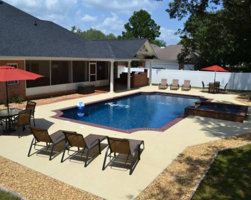 Cairo custom pool design with premium finishes and stone decking.