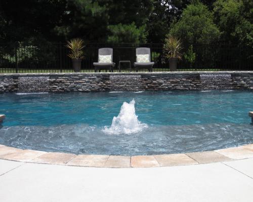 Tallahassee residential swimming pool builders with modern outdoor pool design.