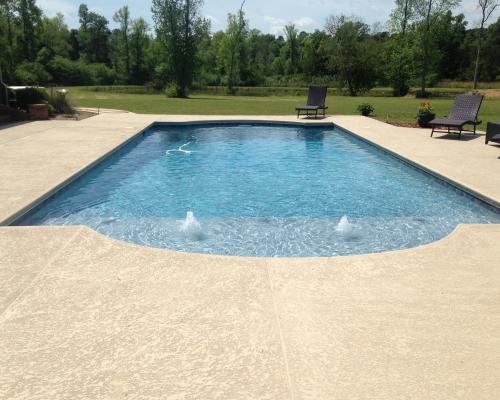 Tallahassee swimming pool builders designing modern outdoor pools.