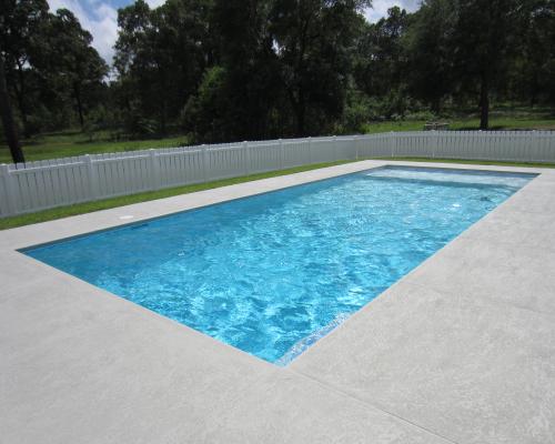 Thomasville swimming pool construction showcasing reinforced structure and stone work.